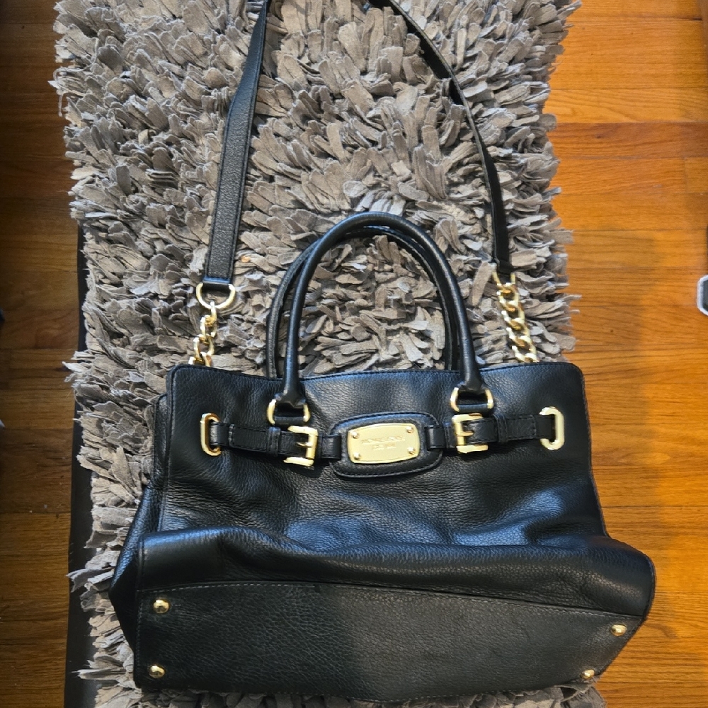 Chic Black Leather Satchel with Gold Accents